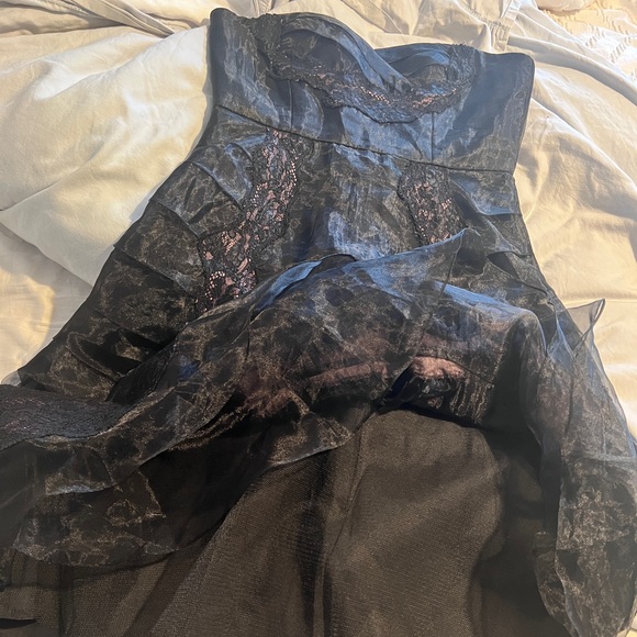 Bcbg size 6 black dress with some purple satin showing behind the lace. - Picture 5 of 7